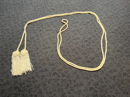 White cincture with - with, tassels